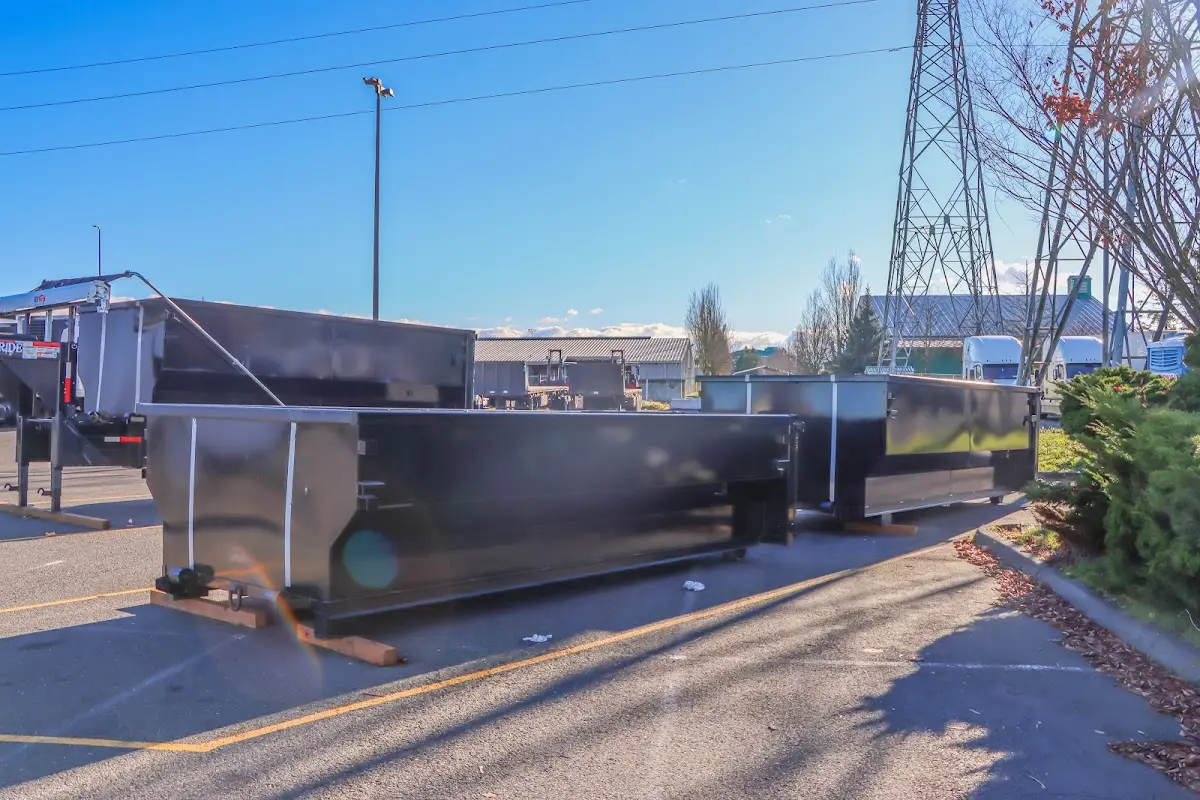 Roll-off dumpster ready for waste disposal at job site for 12 Yard Dumpster Rental in Brownsville